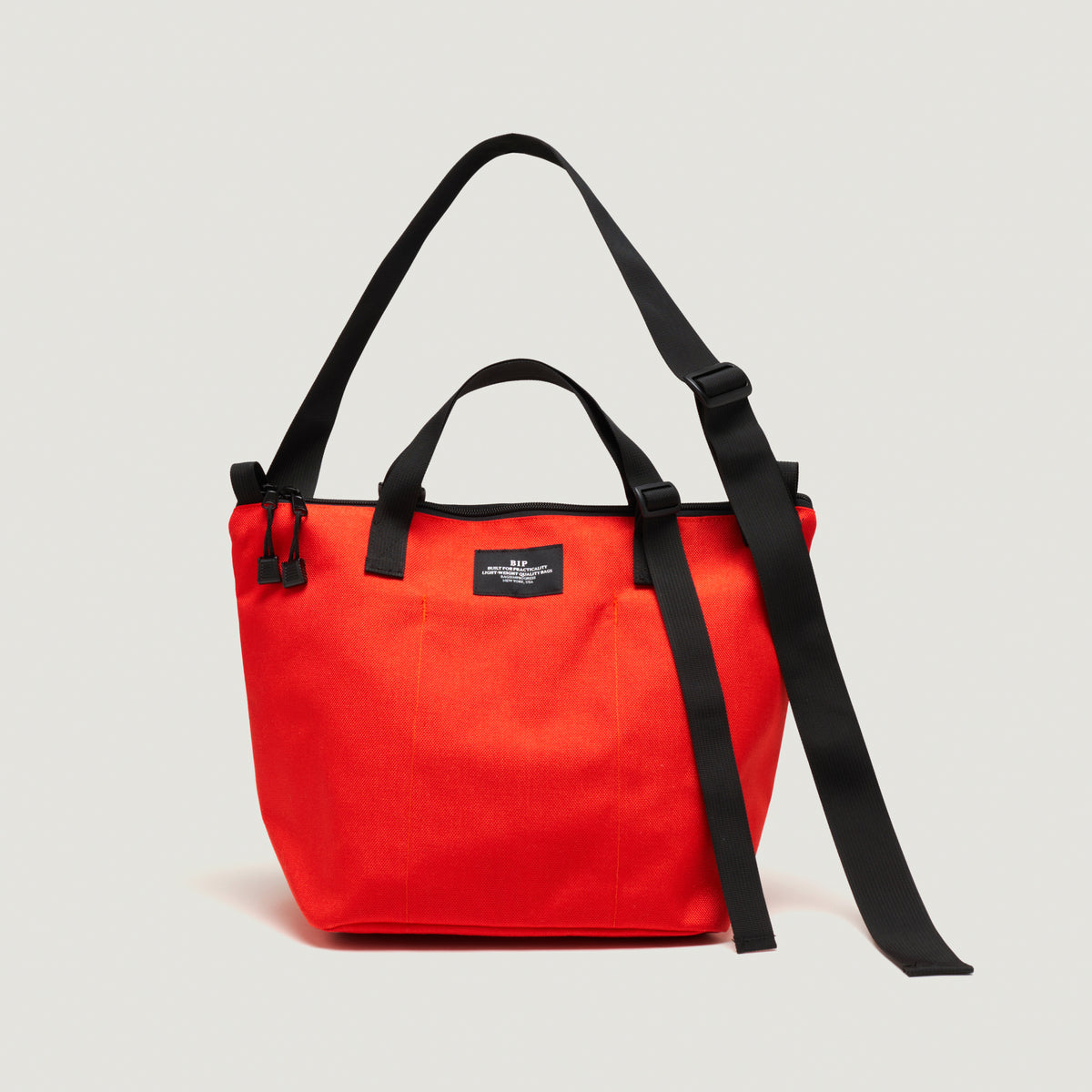 Bags in Progress Traveler Duffle Small - Reddish Orange – Totem 