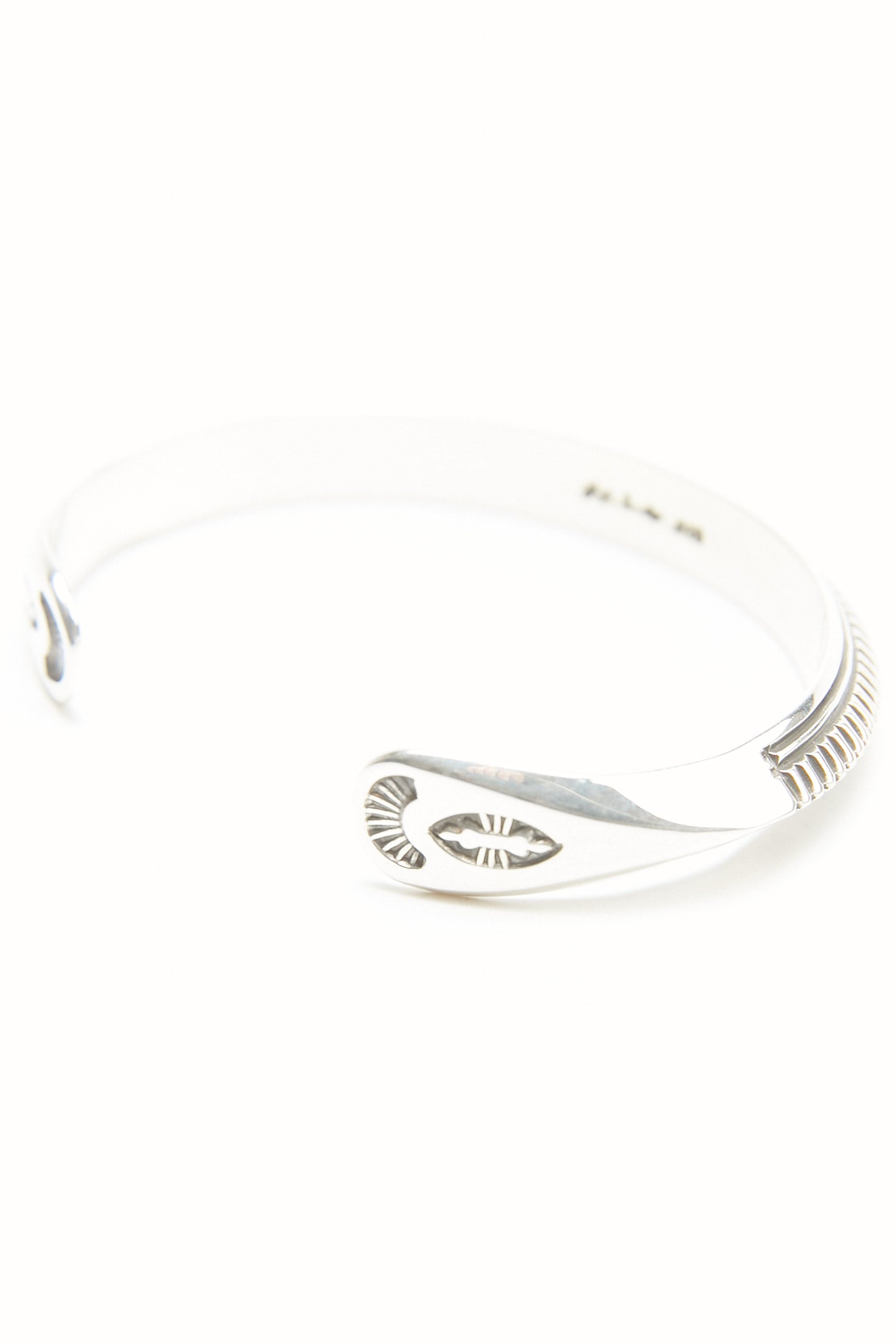 Sterling Silver Triangle Cuff by Lyle Secatero - Abundance and